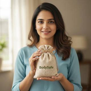 Woman holding BodySafe crystal pouch 150gm at home