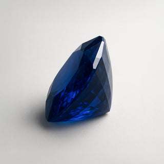 Natural blue sapphire (Neelam) gemstone, faceted cushion cut, front angle view
Title: Natural Blue Sapphire (Neelam) Gemstone - Front View