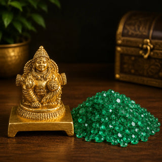 Kubera idol with green crystals for wealth and abundance, from the Vastu Wellness Kit
